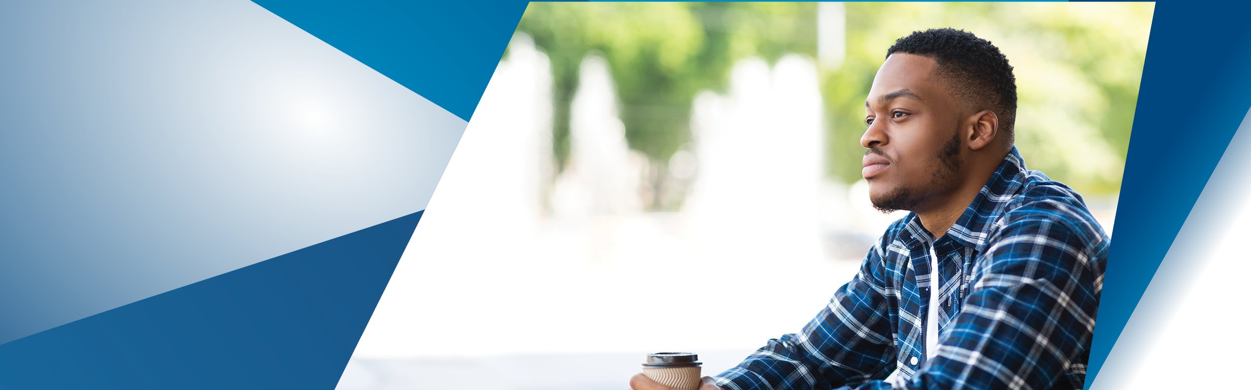 Man Sits Alone Drinking Coffee